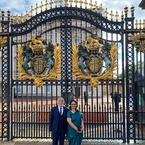 George & Manjula at Buckingham Palace
